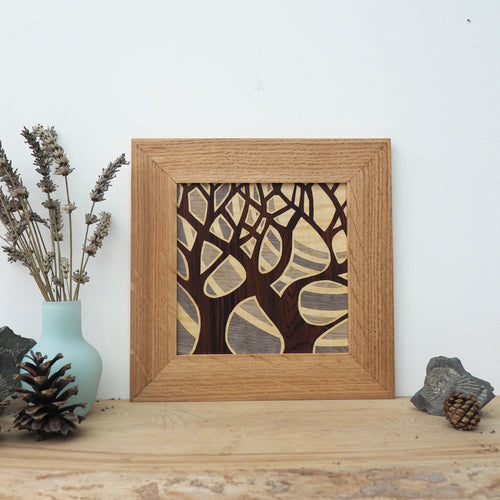 grey sky trees marquetry wall hanging