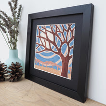 Load image into Gallery viewer, Small tree framed giclee print with blue sky
