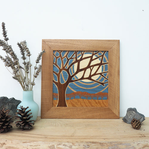 Blue sky and tree marquetry wall hanging